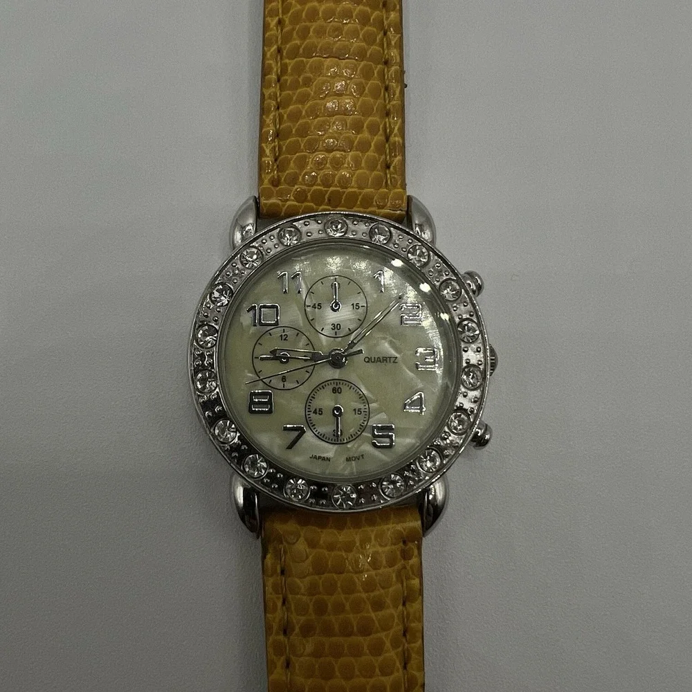 CG Women's Quartz Watch Rhinestone Bezel MOP Dial Plastic Band Needs New Battery